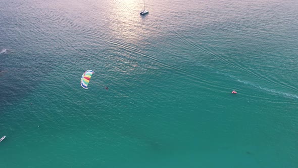 Parasailing at Sunset with a View of the Island