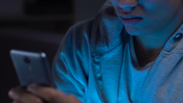 Excited Black Guy Browsing Adult Content Video on Smartphone, Parent Control