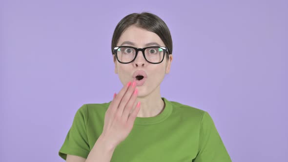 Ambitious Young Woman Get Surprised on  Purple Background
