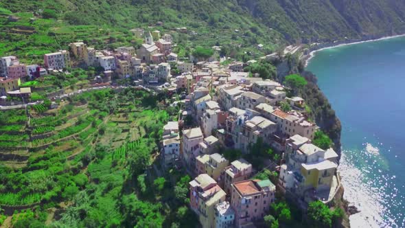 Flight by a drone of Corniglia village one of Cinque Terre coast of Italy in region of Liguria,Italy