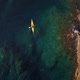 Flying above a kayak on turquoise water - VideoHive Item for Sale