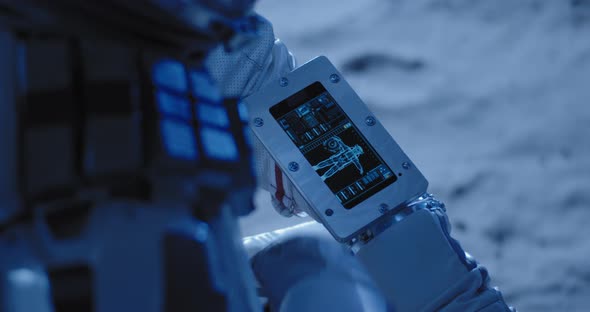 Astronaut Using Touch Screen