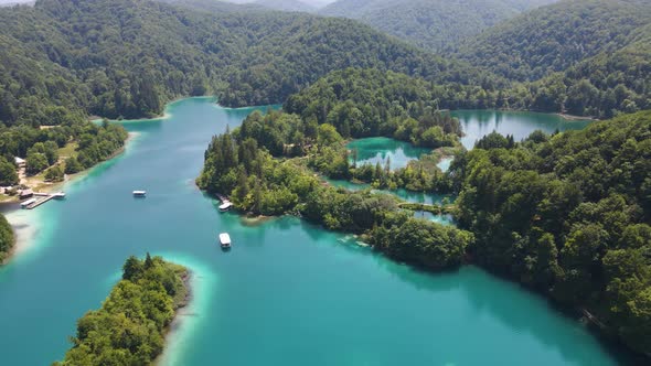 View of the Plitvice Lakes National Park with many green plants and beautiful lakes and waterfalls d