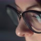 Young Woman in Glasses Uses Computer Tablet Smartphone - VideoHive Item for Sale