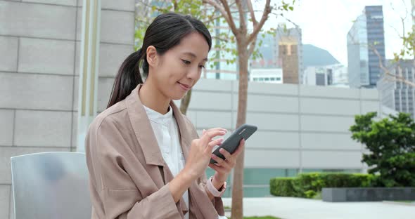 Business woman use of mobile phone