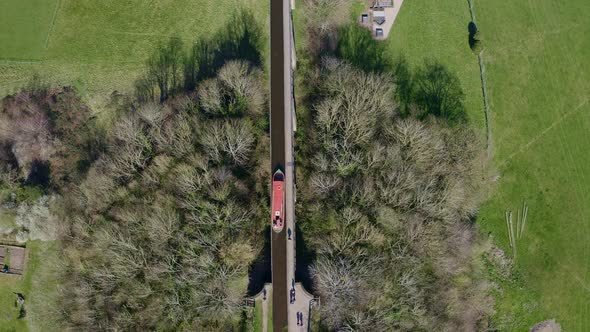 A Narrow Boat Crossing the Pontcysyllte Aqueduct famously designed by Thomas Telford,  located in th