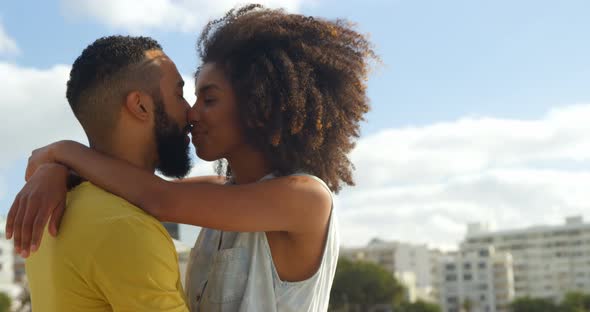 Couple kissing each other at beach 4k