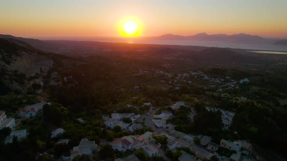 Aerial view approaching sunset over Zia village, Kos, Greece