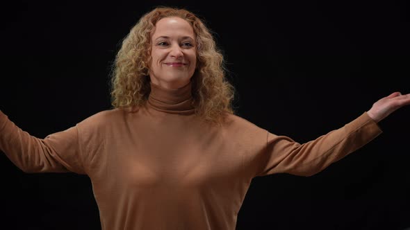 Smiling Politician or Artist Receiving Applauds Looking Around at Black Background