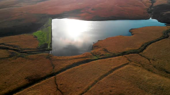 Crane shot of Reservoir in West Yorkshire near Marsden Moor, Peak District National Park, UK