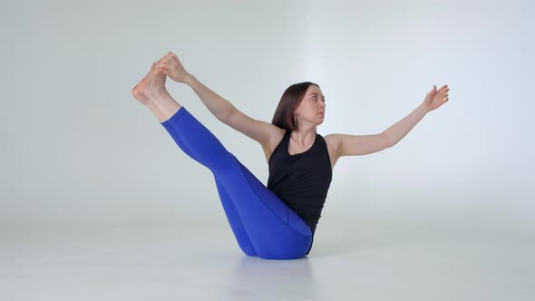 Woman Does Yoga Exercise