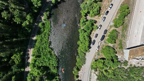 Aerial view of Provo River and vehicles parked next to tunnel