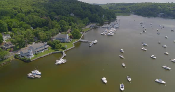Aerial Pan Around Boats Anchored on Cold Spring Harbor Long Island