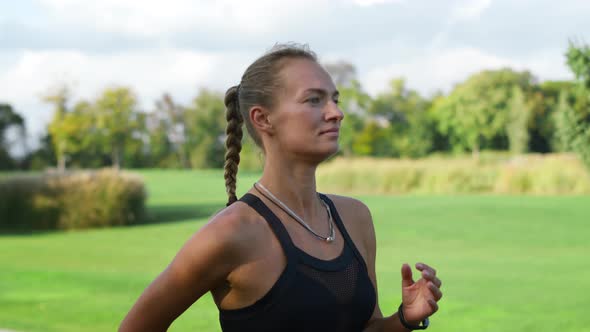 Disabled Woman Jogging in Park, Fit Girl in Sportswear Training in Green Park