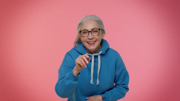Elderly Amused Woman Pointing Finger to Camera Laughing Out Loud of Ridiculous Appearance Funny Joke