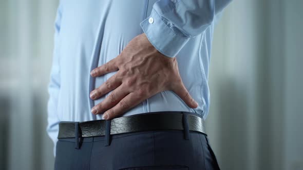 Businessman Feeling Lower Back Pain, Nerves Inflammation, Kidneys Disorder