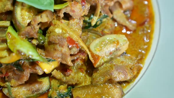Close Up Footage of Thai Exotic Food, Hot and Spicy Stir Fried Wild Boar With Kaffir Lime Leaves and