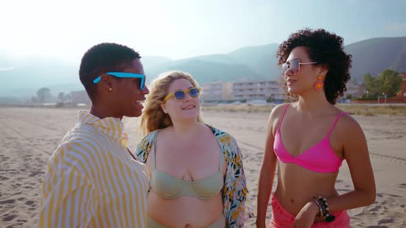 multiethnic young women having fun on the beach