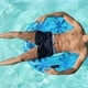 Man floating on inflatable ring in pool, overhead view - VideoHive Item for Sale