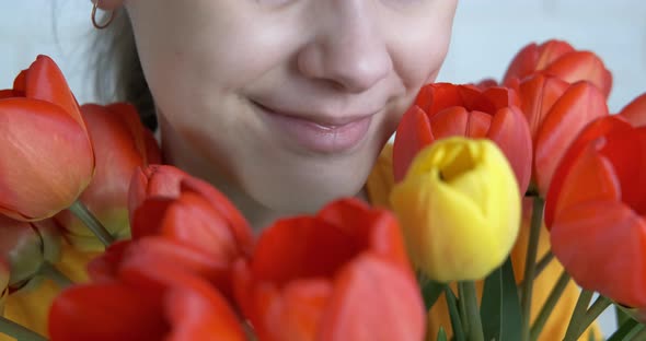 Teenager girl with tulips.