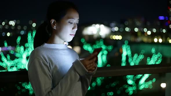 Young woman with mobile phone