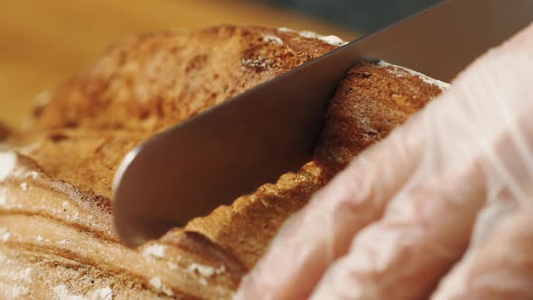 Macro shot Knife cuts delicious bread