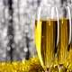 Two glasses of champagne with christmas silver and gold tinsel decoration. - VideoHive Item for Sale