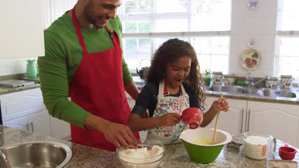 Family making Christmas cookies at home