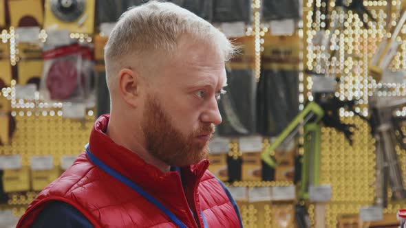 Hardware Store Supervisor Scanning Products