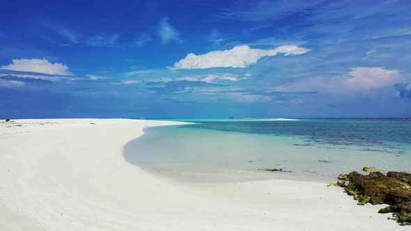Aerial above texture of paradise island beach wildlife by aqua blue lagoon and white sandy backgroun