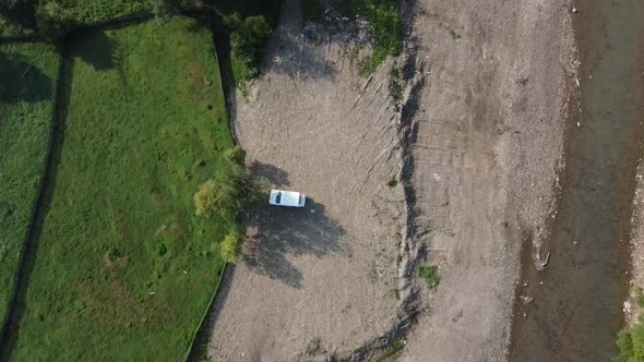 Camping With Motorhome Near River, Aerial View