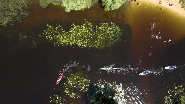 Aerial View From a Drone of a Person Who Floats on a Sup