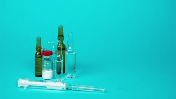 Various Medical Glass Bottle for Vaccination or Treatment. Stop Motion