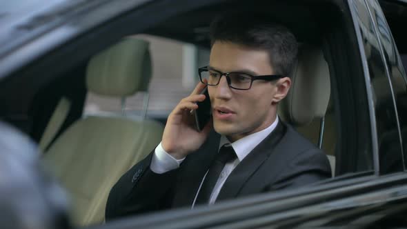 Worried Businessman Talking on Phone, Finding Out About His Bankruptcy, Problems