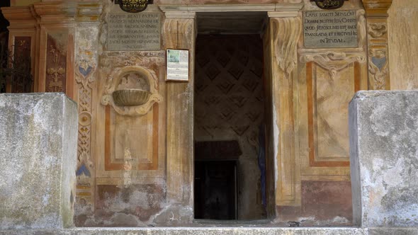 Entrance of Holy Sepulchre at Mountain of Varallo, a christian devotional complex, a unesco world he