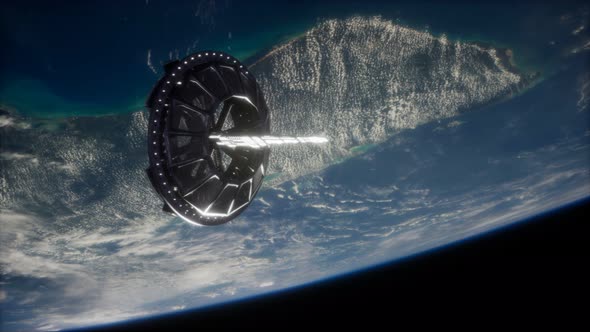 Futuristic Space Satellite Orbiting the Earth alt
