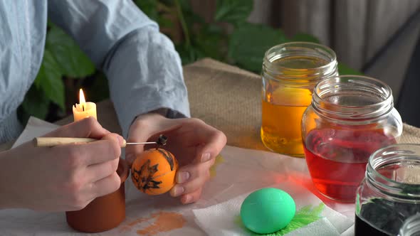 Easter egg painting with beeswax.