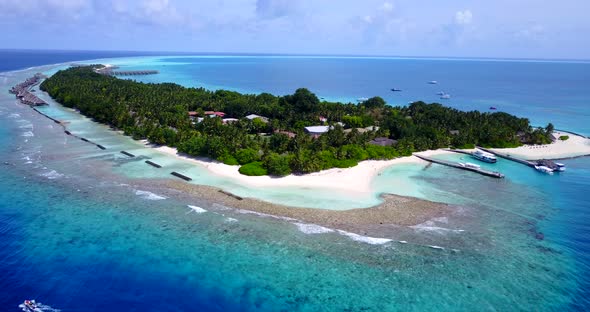 Beautiful drone abstract shot of a summer white paradise sand beach and aqua blue water background