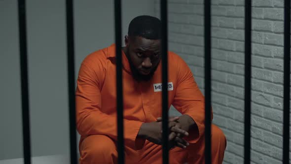 Pensive African-American Prisoner Waiting for Visitors, Serving Life Sentence