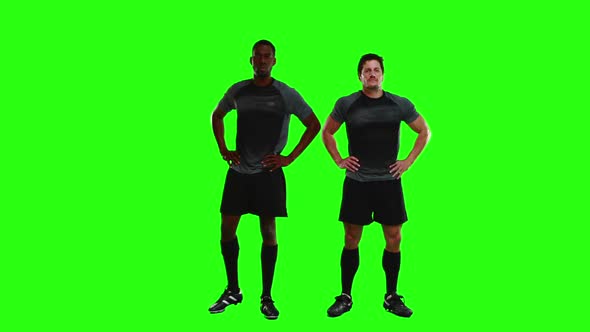Serious Rugby Players Gesturing in Front of Camera