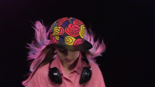 Stylish Teenager Girl Plays Music and Dances at Dj Table alt