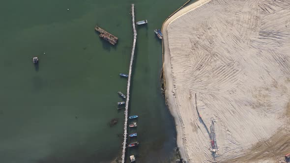 Aerial top down view fisherman wooden bridge jetty