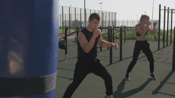 Sport Couple Doing Boxing Exercise