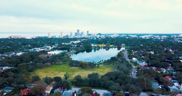 4K Aerial Video Flying Towards Downtown St Petersburg over Crescent Lake Park