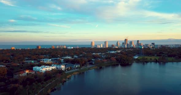 4K Aerial Video of Downtown St Petersburg Tilting Down to Crescent Lake Park