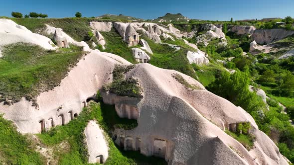 Awesome aerial view of rock formations called the Fairy Chimneys in Cappadocia 4 K
