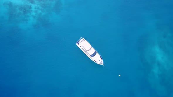 Aerial panorama of tourist beach wildlife by blue lagoon and sand background