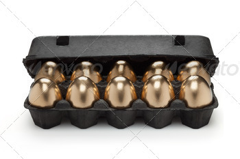 t of golden eggs in a carton pack on white background.