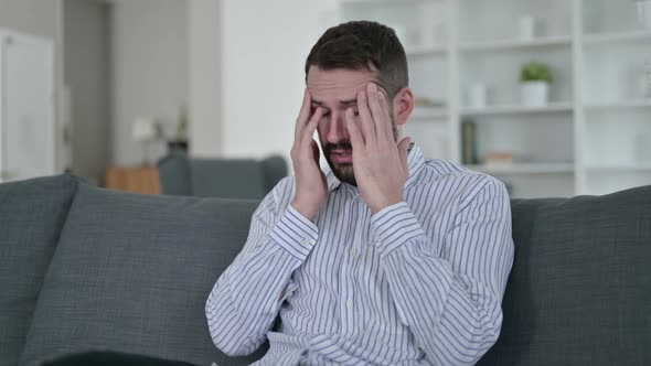 Disappointed Young Man Feeling Worried at Home 