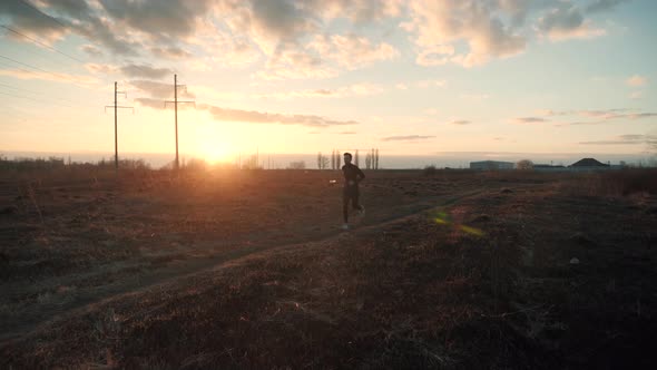 Man Run At Sunset. Man Running. Runner Male Jogging At Sunrise. Running Man Exercising On Trail.